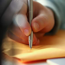 photo concept of appraiser reviewing documents