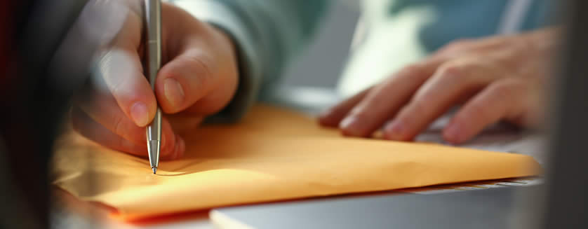 photo concept of appraiser reviewing documents