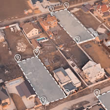 image of a real estate appraiser looking over vacant land